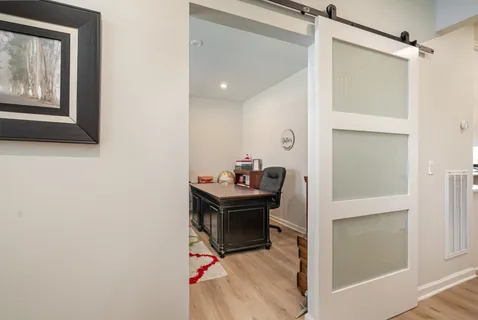 a room with a table and a mirror