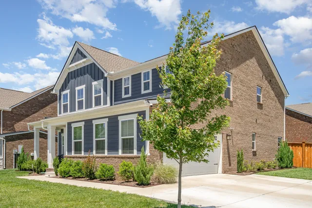 front view of house with a yard