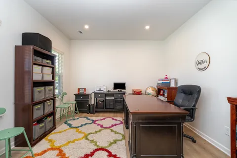 a view of a workspace with furniture