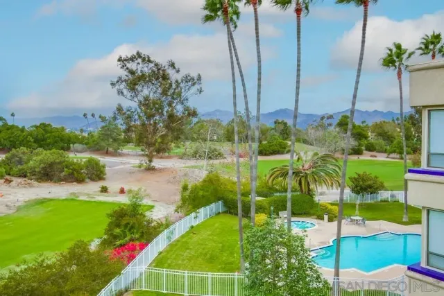 a view of an entryway with flower plants