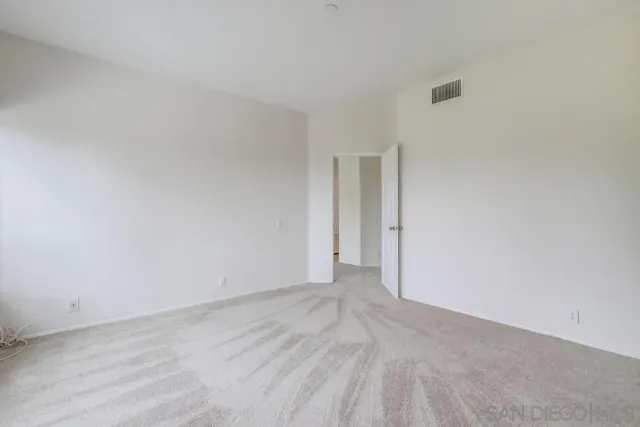 an empty room with window