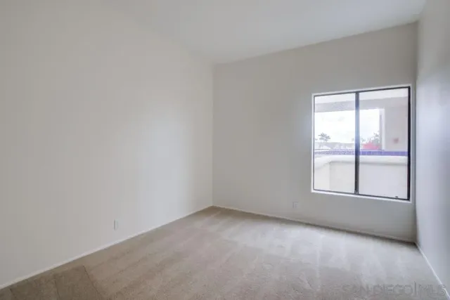 a view of swimming pool from a balcony