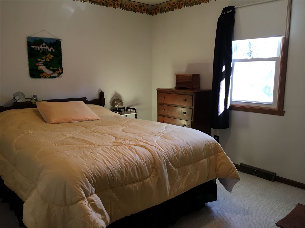 3289 North Trainer Road Rockford, IL 61114 - Photo 12 of 19 a bedroom with a bed and a window
