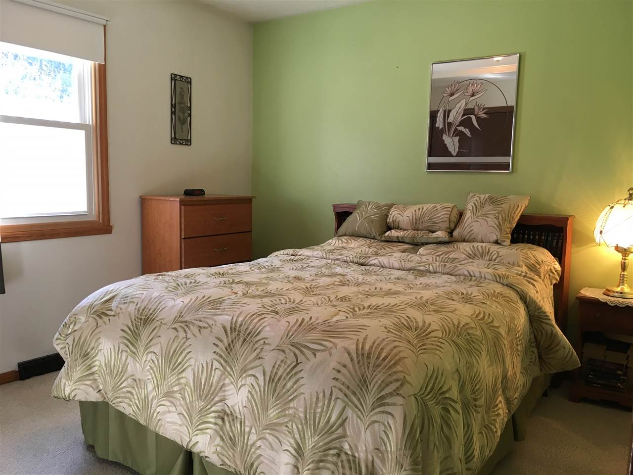 3289 North Trainer Road Rockford, IL 61114 - Photo 13 of 19 a bedroom with a bed and a window