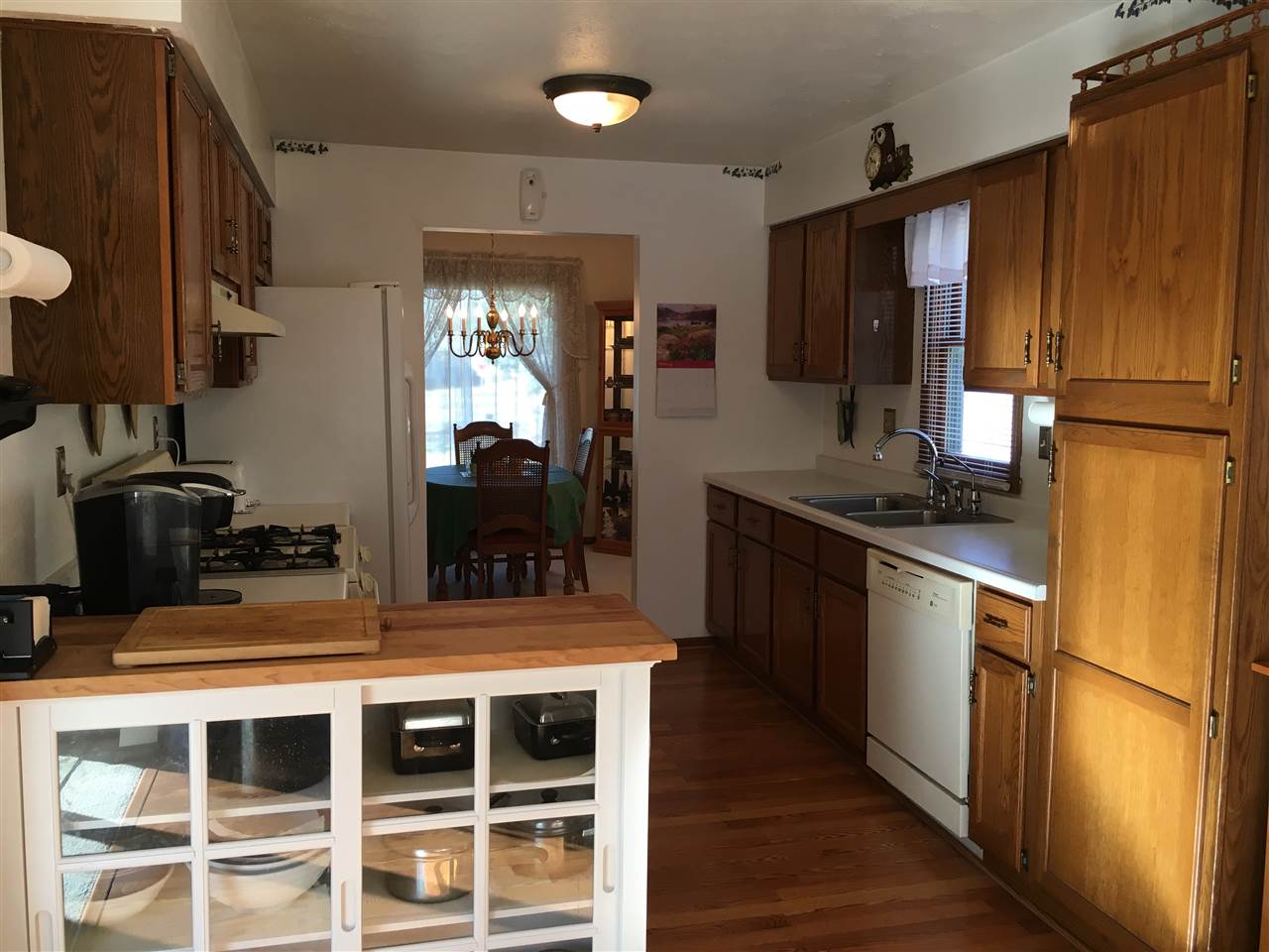 3289 North Trainer Road Rockford, IL 61114 - Photo 5 of 19 a kitchen with kitchen island a counter top space a sink stainless steel appliances and cabinets