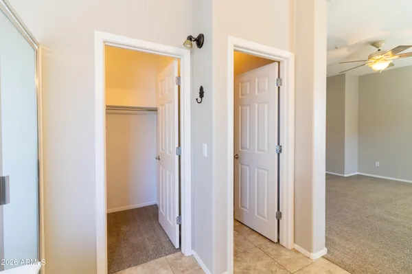 a view of a bathroom from a hallway