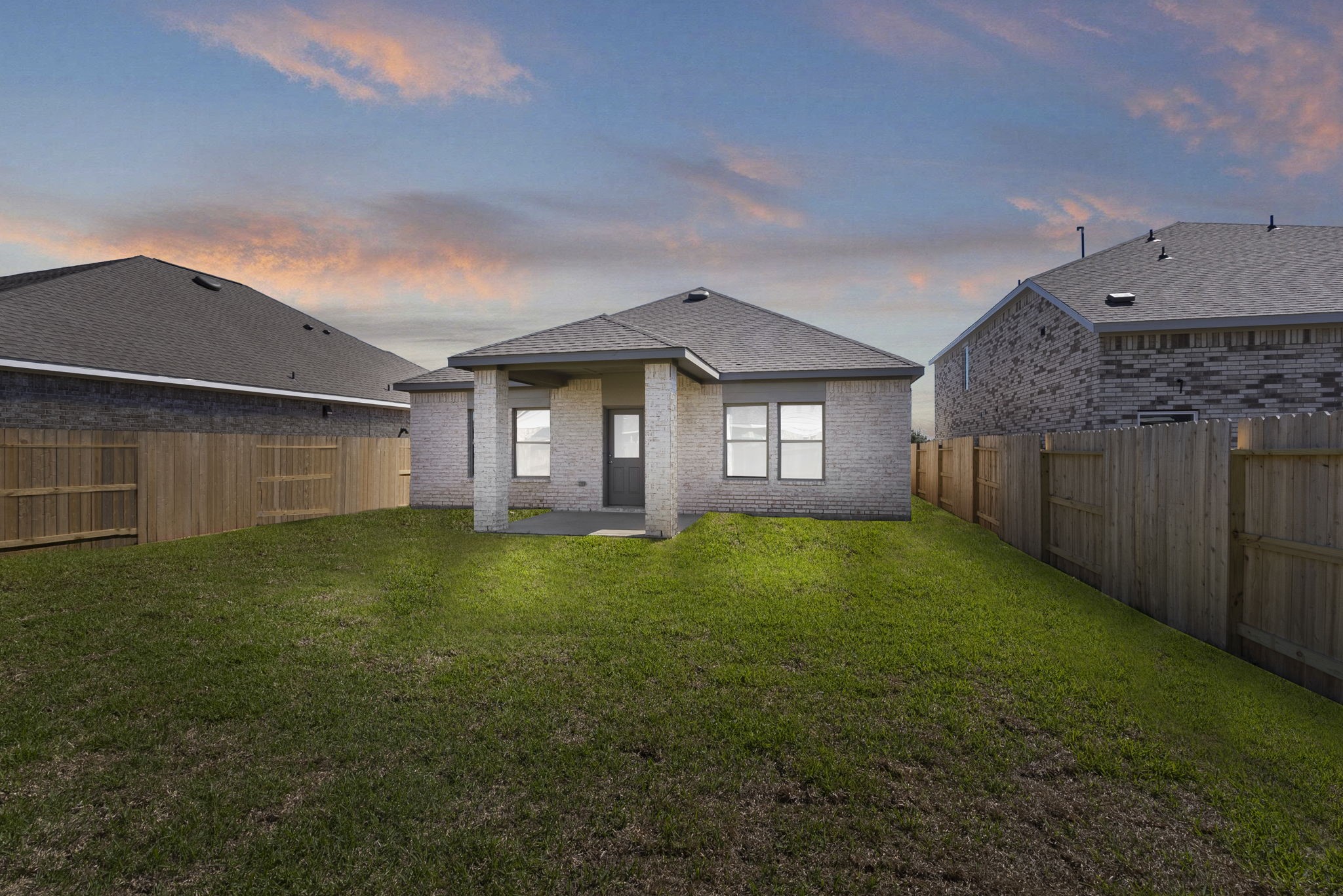 3627 Atlas Pt Lane Angleton, TX 77515 - Photo 23 of 36 a front view of a house with a garden
