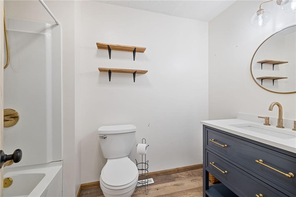 351 Pleasant Valley Road Washington, PA 15301 - Photo 12 of 41 a bathroom with a toilet a sink and mirror