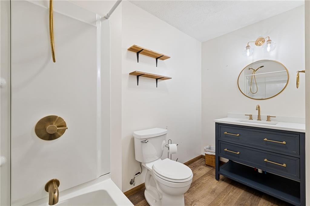 351 Pleasant Valley Road Washington, PA 15301 - Photo 13 of 41 a bathroom with a toilet a sink and mirror