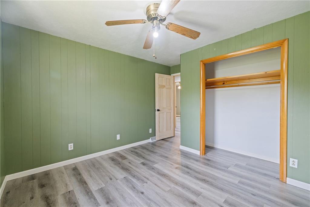 351 Pleasant Valley Road Washington, PA 15301 - Photo 15 of 41 a view of an empty room with wooden floor