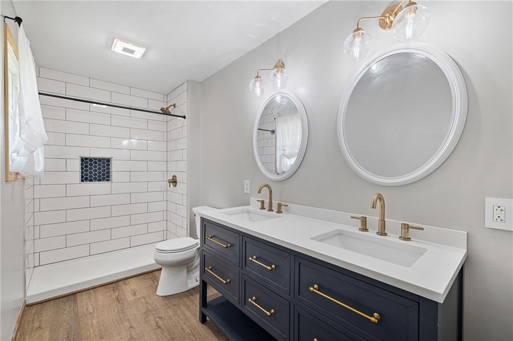 351 Pleasant Valley Road Washington, PA 15301 - Photo 21 of 41 a bathroom with a double vanity sink mirror and toilet