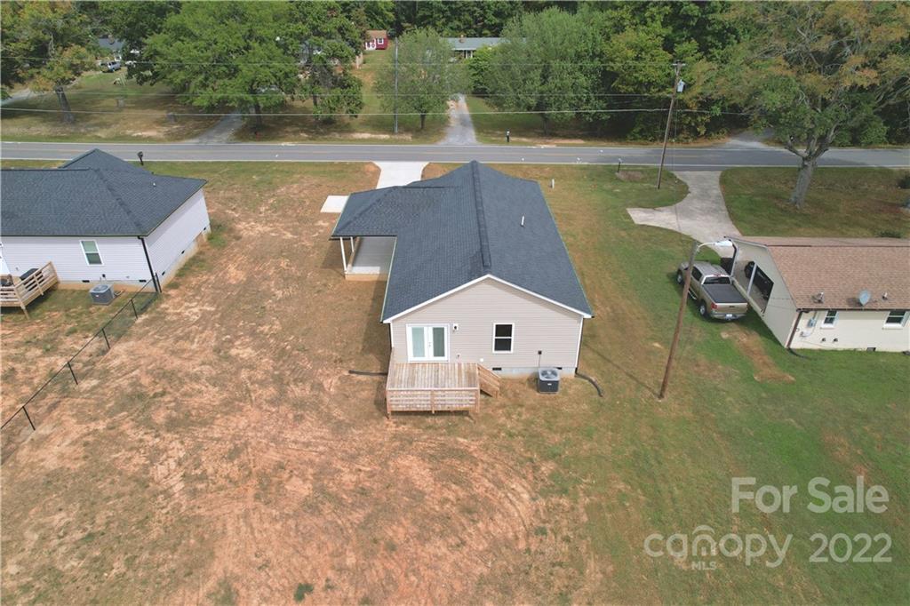 1324 Long Branch Road, Unit 2 Grover, NC 28073 - Photo 19 of 24 a view of a house with a yard and a lake view