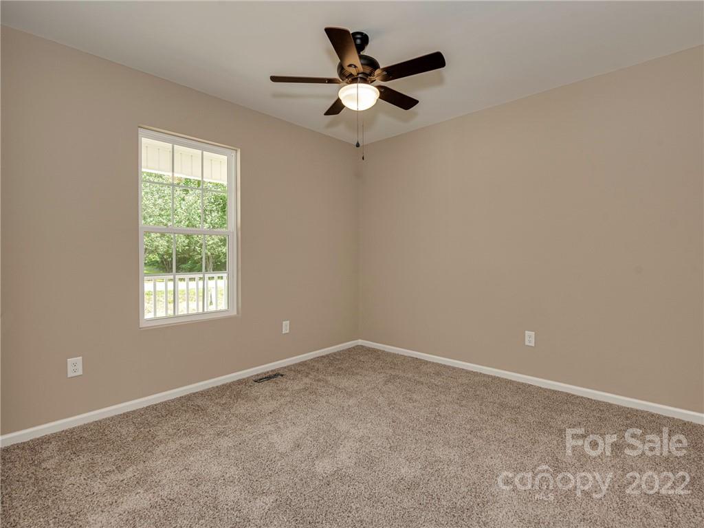 1324 Long Branch Road, Unit 2 Grover, NC 28073 - Photo 8 of 24 a view of an empty room with a window