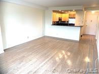 2 Richmond Road, Unit 4O Lido Beach, NY 11561 - Photo 6 of 18 a view of a living room with a wooden floor