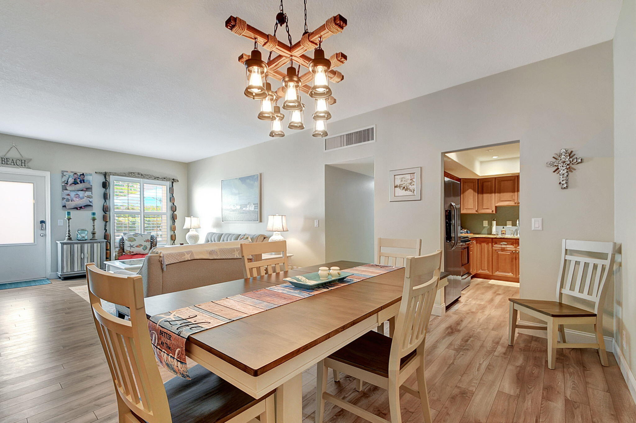 3230 South Ocean Boulevard, Unit C100 Palm Beach, FL 33480 - Photo 21 of 49 a view of a dining room with furniture window and wooden floor