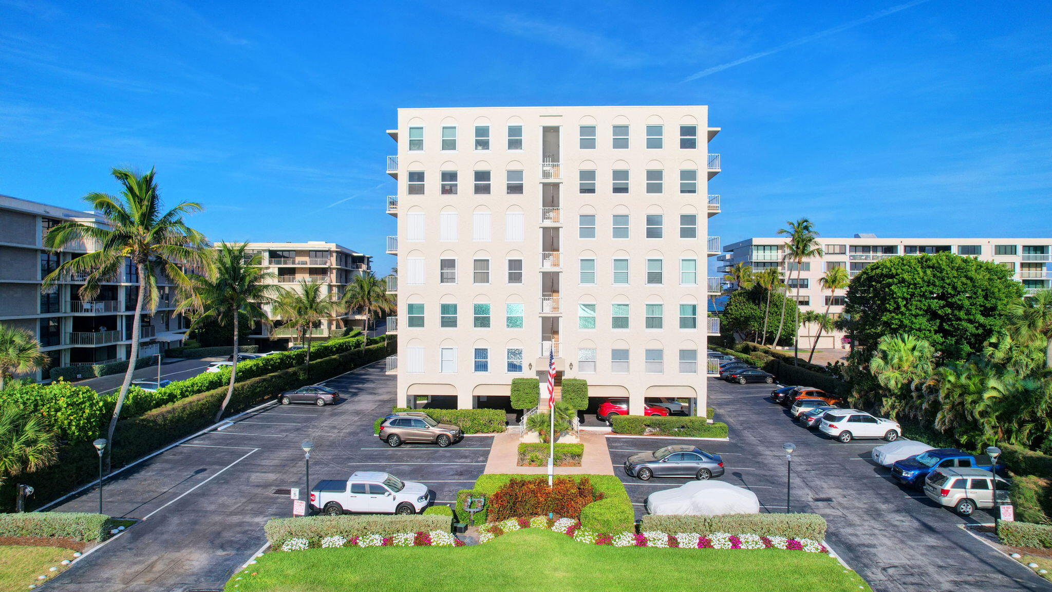 3230 South Ocean Boulevard, Unit C100 Palm Beach, FL 33480 - Photo 4 of 49 a front view of a building with an outdoor space