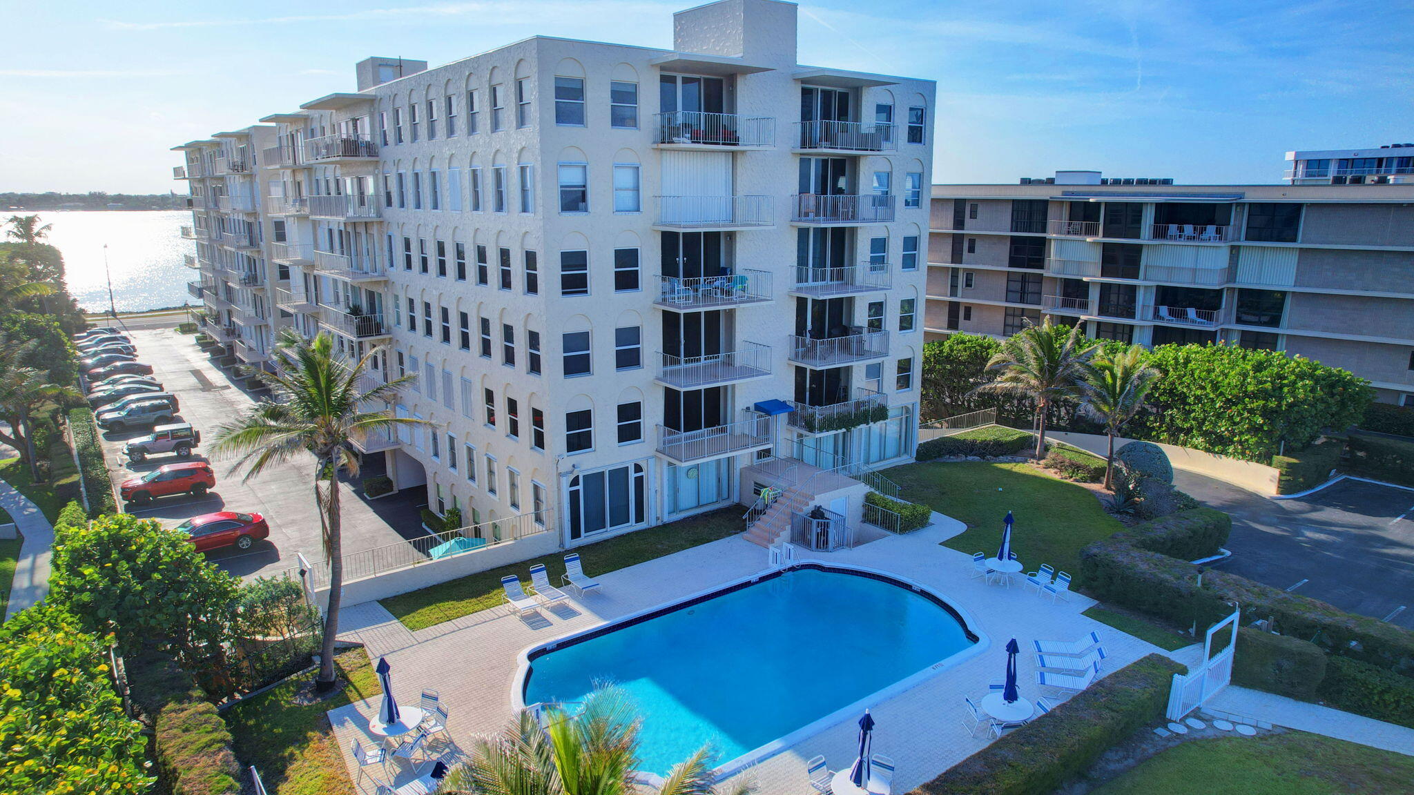 3230 South Ocean Boulevard, Unit C100 Palm Beach, FL 33480 - Photo 45 of 49 a view of a building with garden