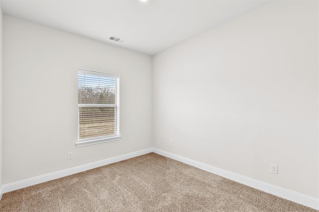 6329 Mason Court Dallas, TX 75227 - Photo 23 of 34 an empty room with a window
