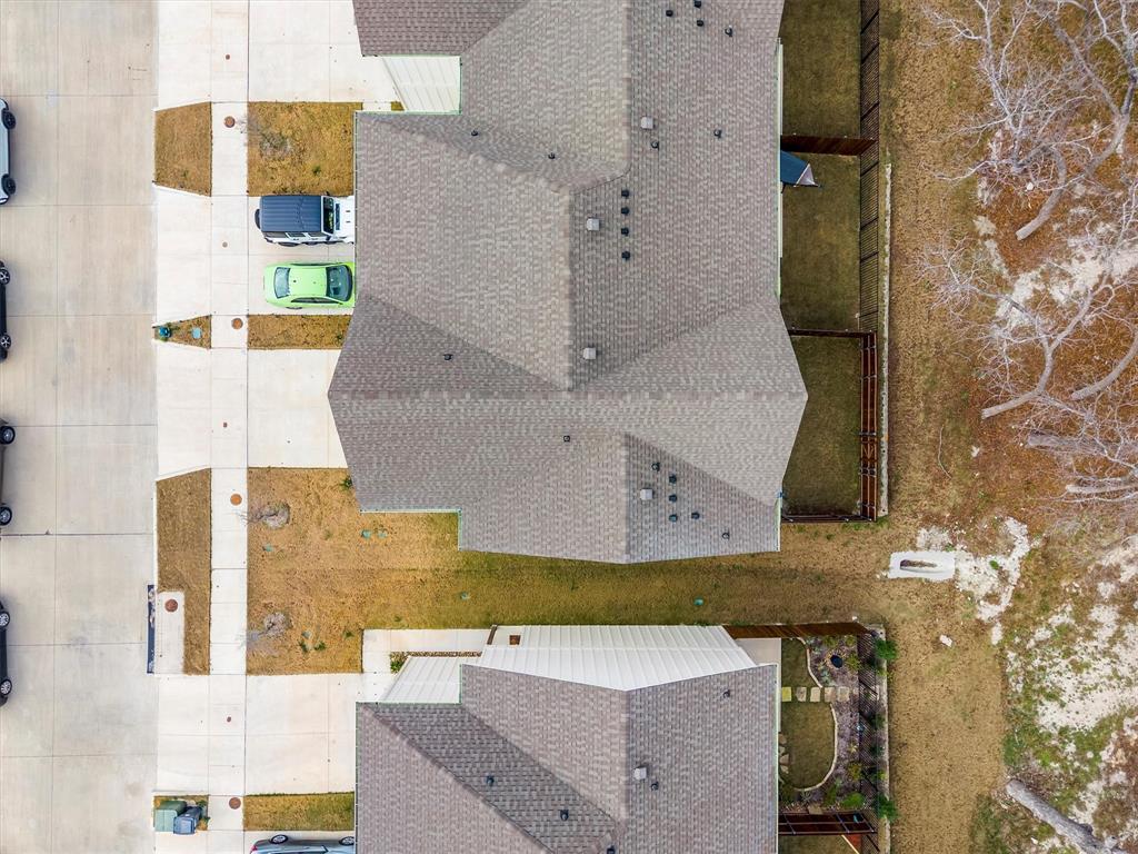 6329 Mason Court Dallas, TX 75227 - Photo 30 of 34 an aerial view of residential houses with outdoor space