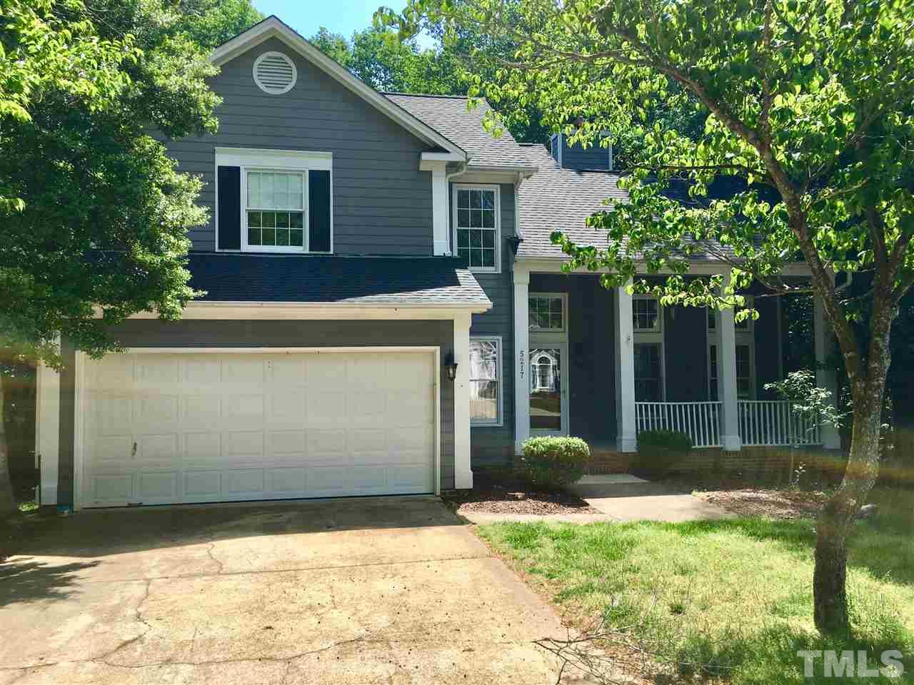 5217 Blakeley Lane Raleigh, NC 27613 - Photo 2 of 14 a front view of a house with garden