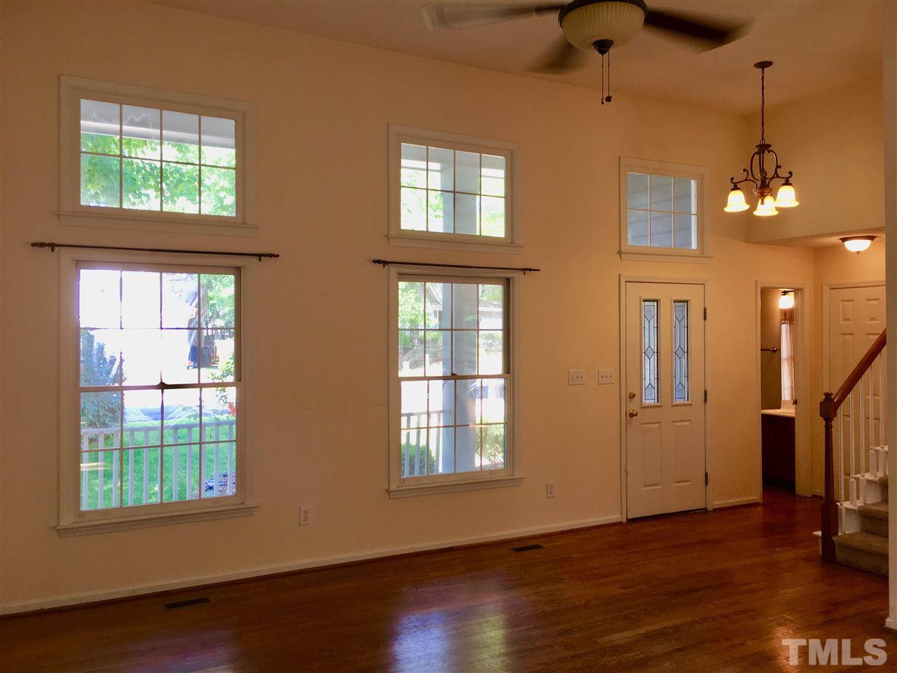 5217 Blakeley Lane Raleigh, NC 27613 - Photo 7 of 14 a view of livingroom and hardwood