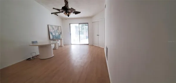 a view of an empty room and window
