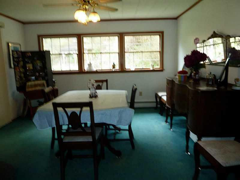 1416 Washington Road Marion Center, PA 15759 - Photo 4 of 11 Dining Room. fan light, doors to covered deck