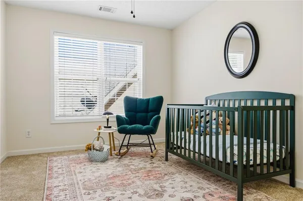 a children room with toys and a flat screen tv