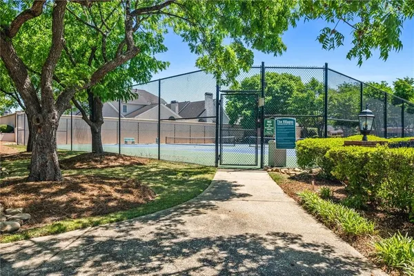 a view of swimming pool with a yard
