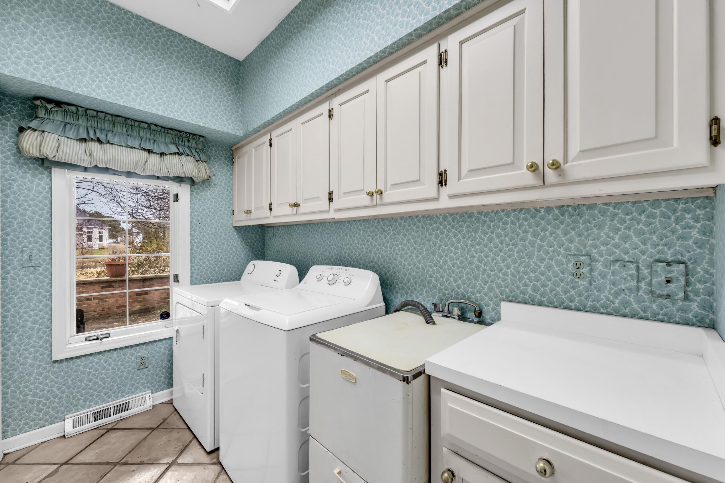 101 Lamplighter Lane Wind Point, WI 53402 - Photo 15 of 51 First floor laundry
