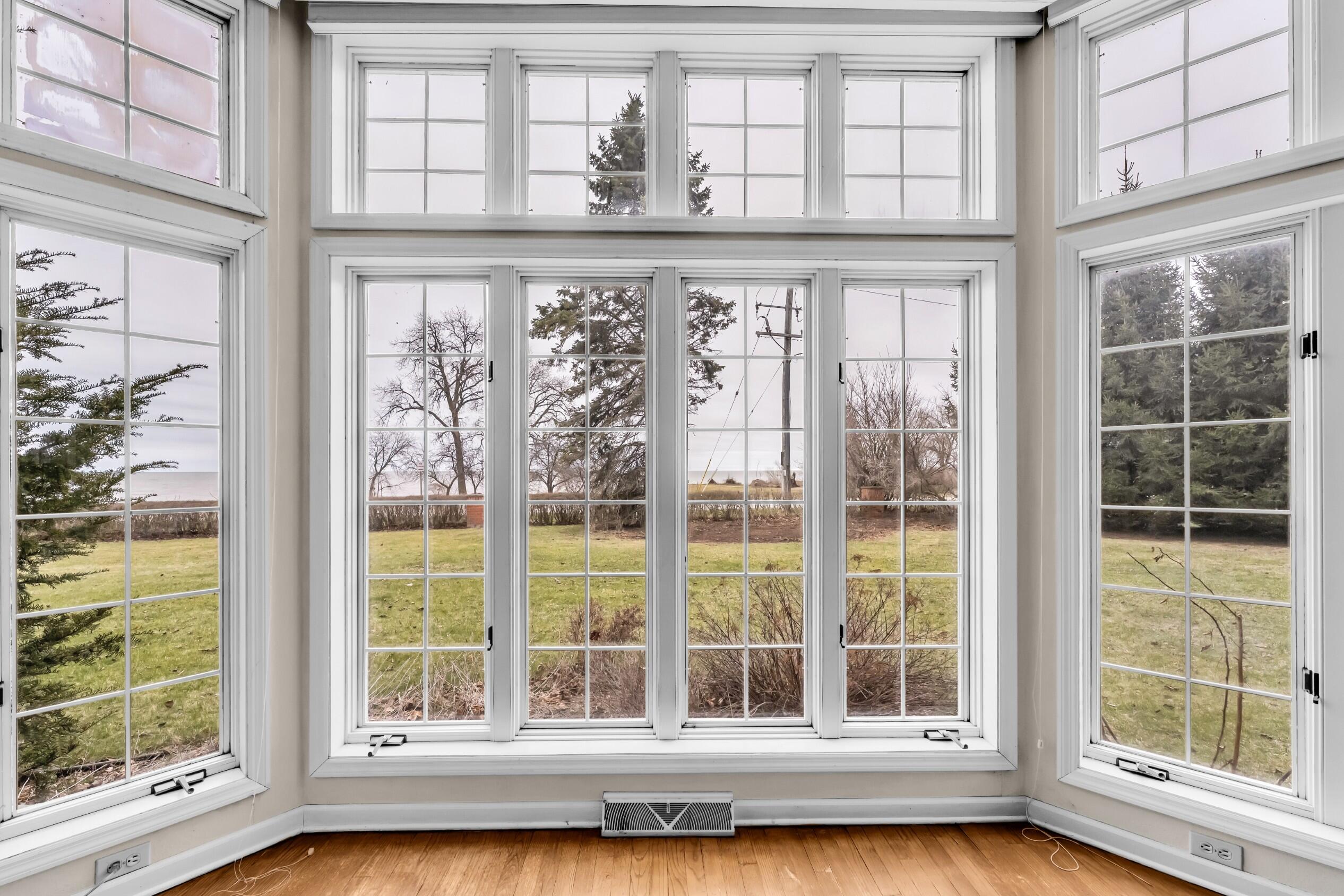 101 Lamplighter Lane Wind Point, WI 53402 - Photo 22 of 51 Wall of windows facing east