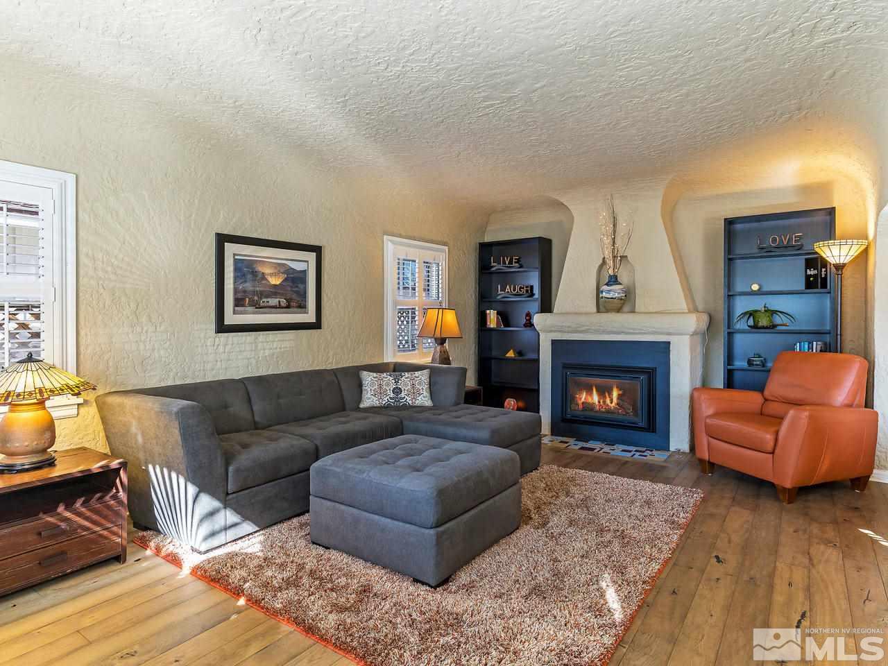 885 La Rue Avenue Reno, NV 89509 - Photo 2 of 18 a living room with furniture and a fireplace