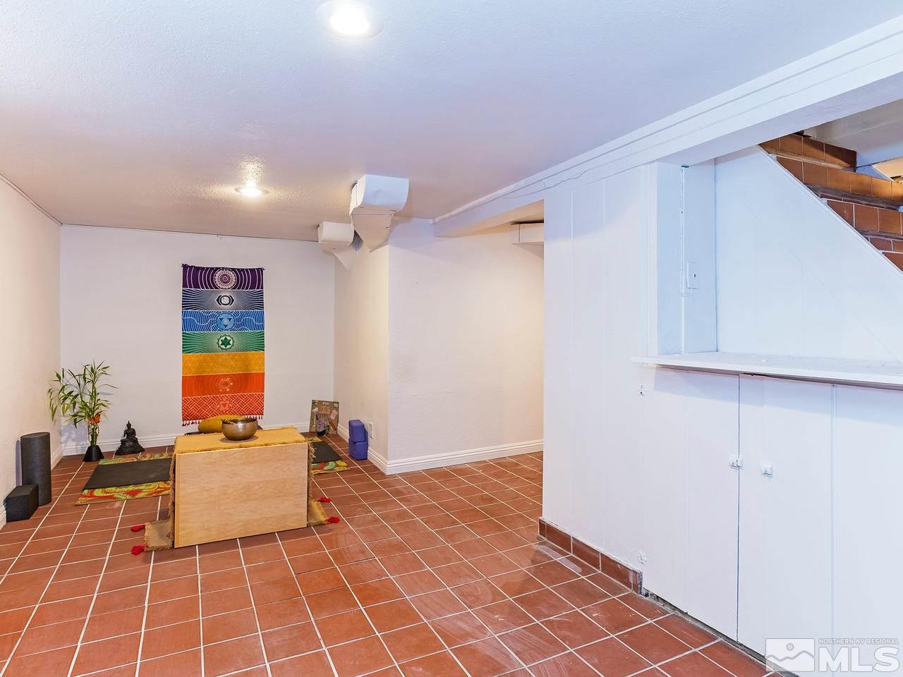 885 La Rue Avenue Reno, NV 89509 - Photo 10 of 18 a hallway with a black white checkered floor
