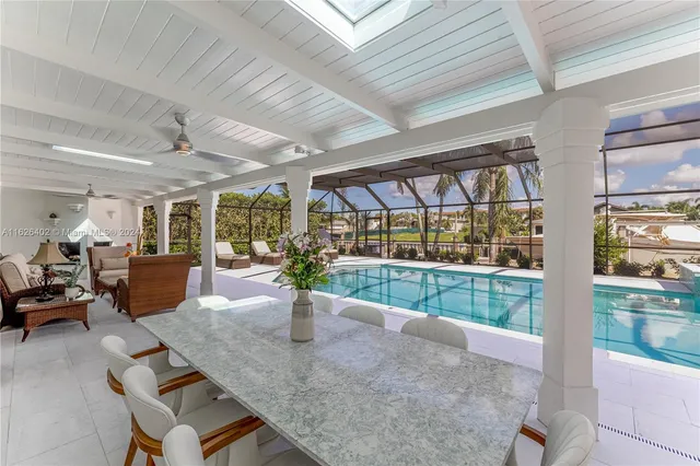 a view of an dining room and livingroom with furniture
