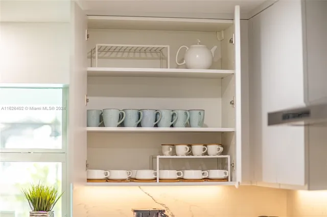 a front view of a house with a garden and porch