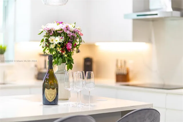 a vase of flowers sitting on a table