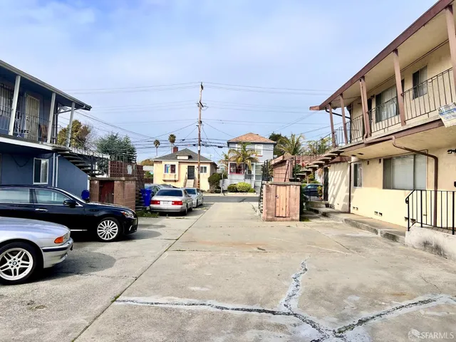 a view of a cars park in front of house