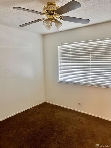 a view of a window in an empty room