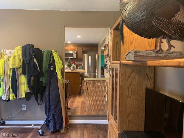 4713 Highway 534 Rome, OH 44085 - Photo 13 of 21 Stairs featuring dark hardwood / wood-style floors