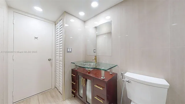 a bedroom with a bed and a table in it