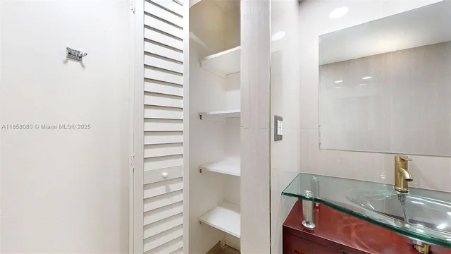 a bedroom with a balcony a bed and a couch