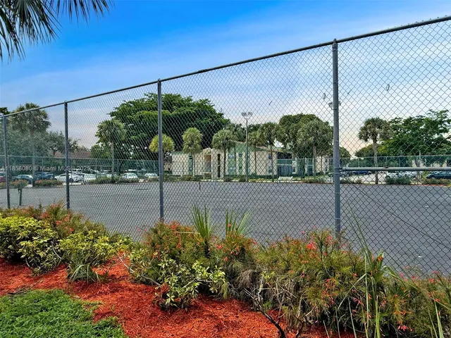 a view of swimming pool from a balcony