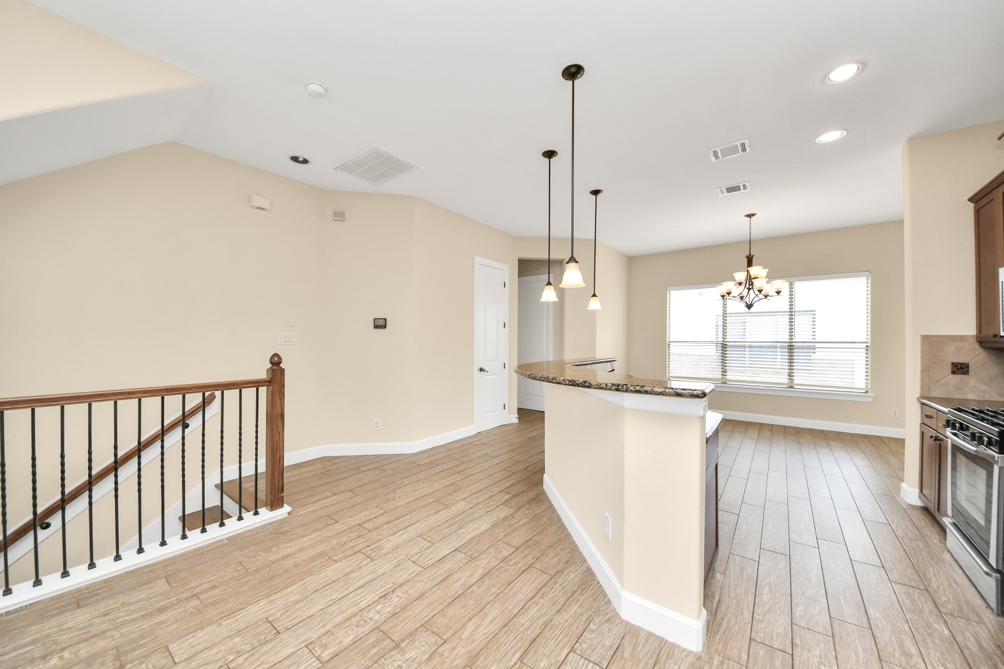 2830 Polk Street Houston, TX 77003 - Photo 13 of 21 The open-concept design flows naturally into the kitchen and dining spaces, making entertaining feel effortless and everyday living feel connected.