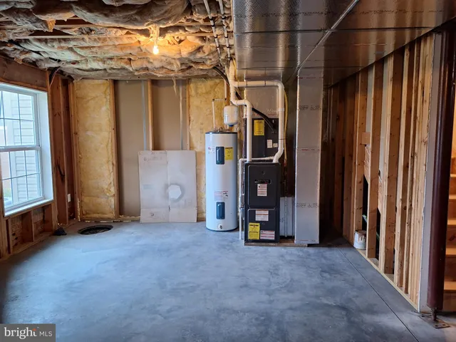 a view of empty room with staircase