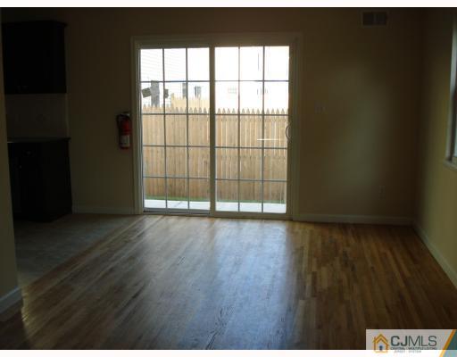 10 Edwin Street Carteret, NJ 07008 - Photo 5 of 10 a view of a livingroom with wooden floor