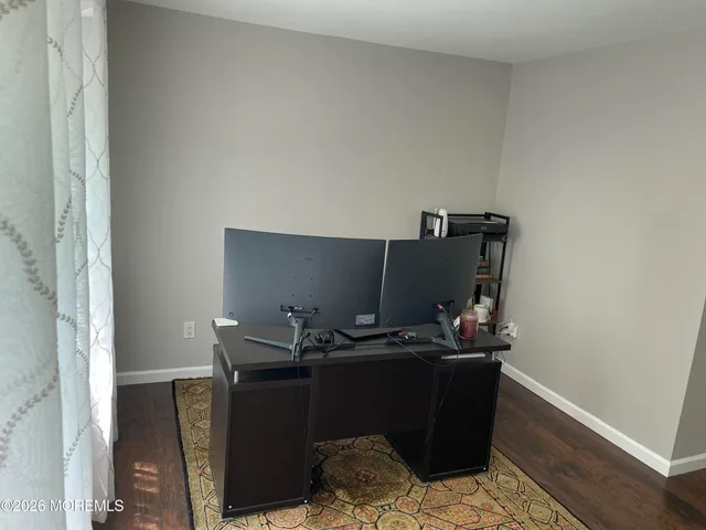 a room with furniture and air conditioner