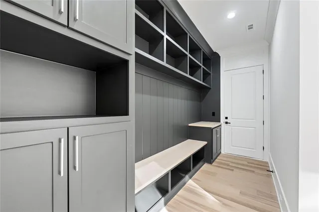 a kitchen with a sink a stove and a refrigerator