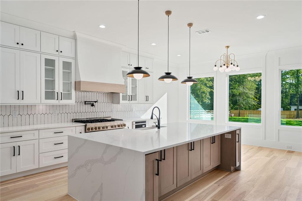 876 Bramlett Shoals Road Lawrenceville, GA 30045 - Photo 21 of 64 a kitchen with counter top space and appliances