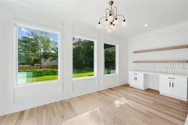 a bathroom with a sink a mirror and a bathtub