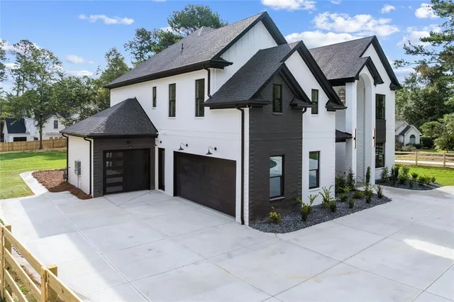 a front view of a house with yard